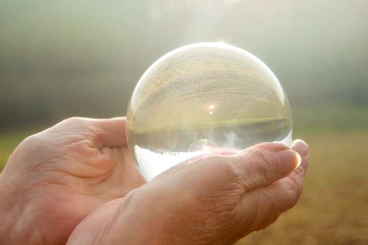 Hands Holding Crystal Ball